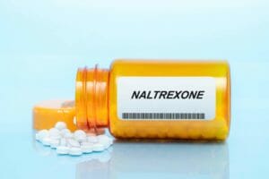 spilled bottle of naltrexone pills